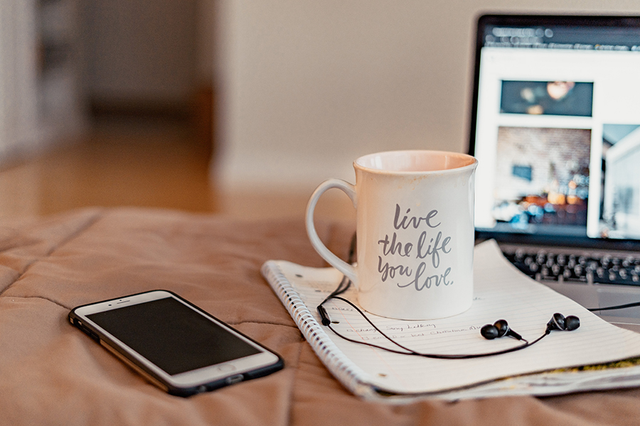 Learning online with laptop and coffee