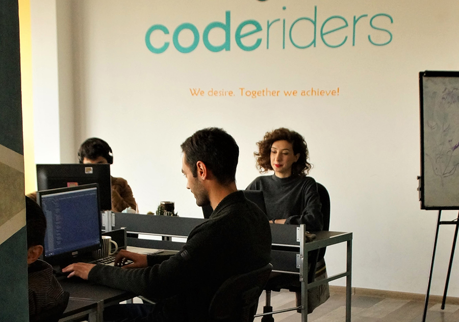 CodeRiders senior-level software developers working on projects
